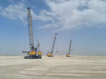 Dynamic compaction process with Bauer cable excavator MC 96